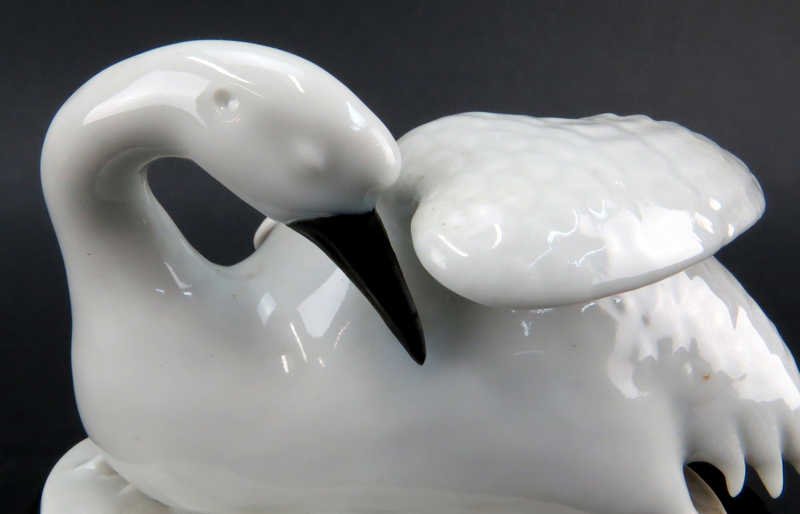 Pair of Chinese Blanc De Chine Swan Figures on Hardwood Stands