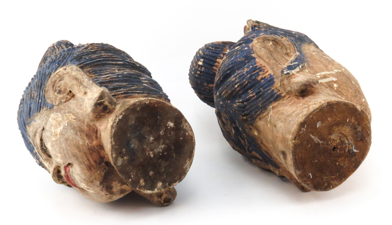 Two Chinese Polychrome Carved Buddha Heads