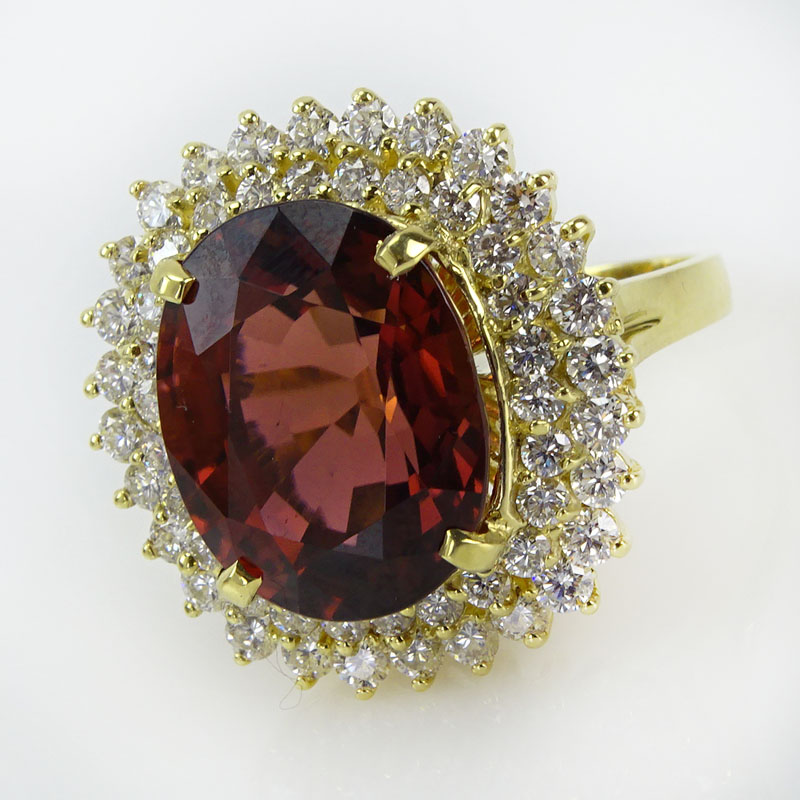 20.0 Carat Oval Cut Rubelite, 2.70 Carat Round Brilliant Cut Diamond and 18 Karat Yellow Gold Ring. 