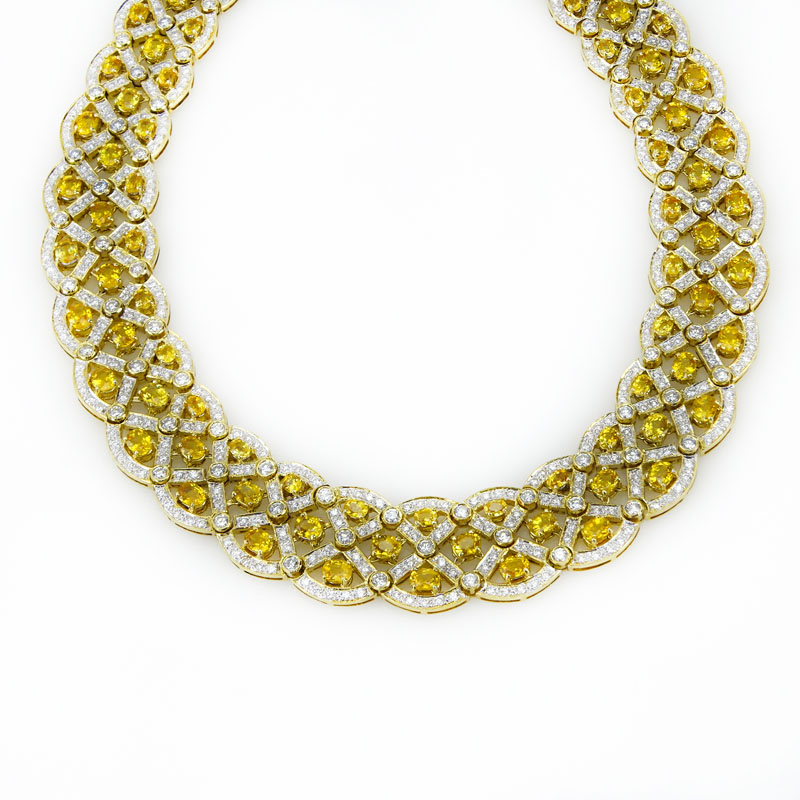  37.0 Carat Oval Cut Yellow Sapphire, 21.0 Carat Round Brilliant Cut Diamond and 18 Karat Yellow Gold Necklace. 