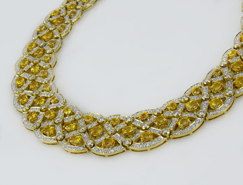  37.0 Carat Oval Cut Yellow Sapphire, 21.0 Carat Round Brilliant Cut Diamond and 18 Karat Yellow Gold Necklace. 