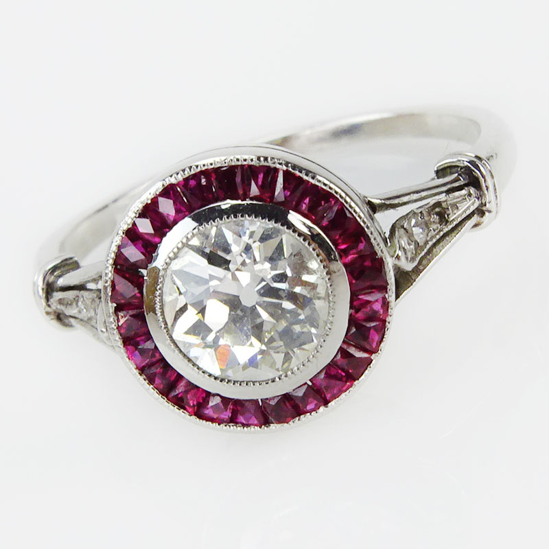 85 Carat Old European Cut Diamond and Platinum Engagement Ring accented with Calibre Cut Rubies.