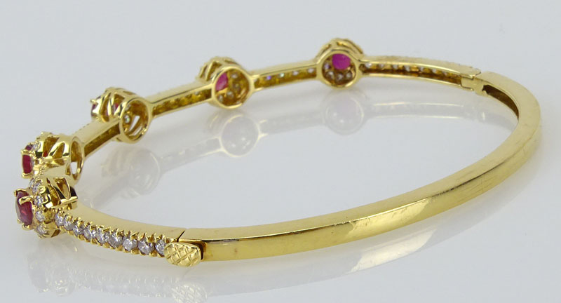 1.56 Carat Round Cut Ruby, 1.43 Carat Round Brilliant Cut Diamond and 18 Karat Yellow Gold Bangle Bracelet. 