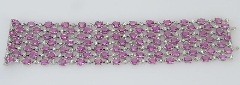 78.00 Carat Oval Cut Pink Sapphire, 6.06 Carat Round Brilliant Cut Diamond and 18 Karat White Gold Bracelet. 