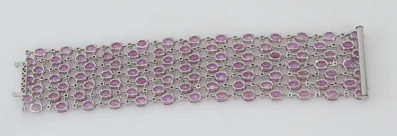 78.00 Carat Oval Cut Pink Sapphire, 6.06 Carat Round Brilliant Cut Diamond and 18 Karat White Gold Bracelet. 