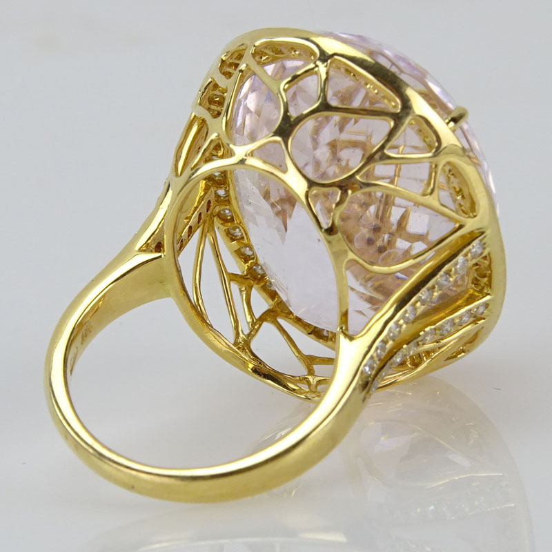 50.0 Carat Oval Cut Kunzite, 1.02 Carat Round Brilliant Cut Diamond and 18 Karat Yellow Gold Ring. 