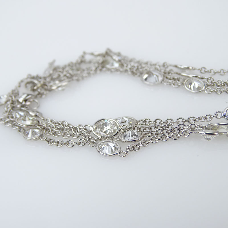 11.31 Carat Oval Cut Diamond and 18 Karat White Gold Diamonds by the Yard Necklace.