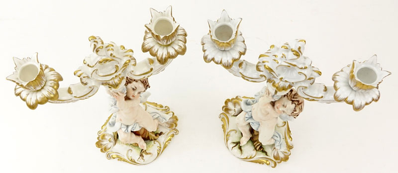 Pair of Capodimonte Putti Figural Porcelain Candlesticks