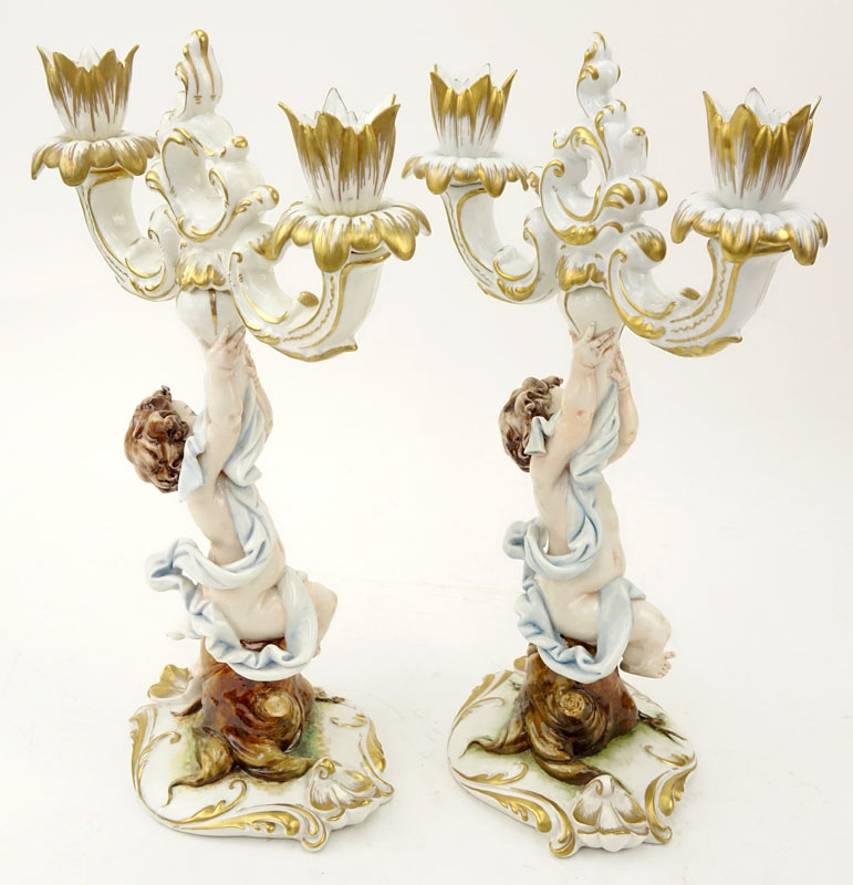 Pair of Capodimonte Putti Figural Porcelain Candlesticks