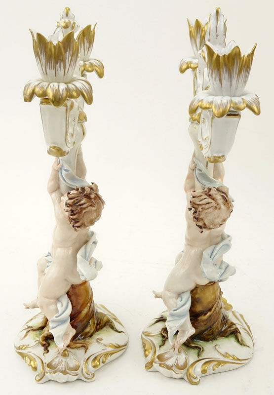 Pair of Capodimonte Putti Figural Porcelain Candlesticks