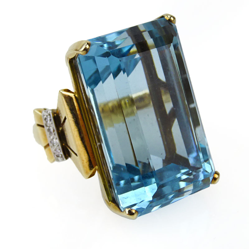 60.0 Carat Emerald Cut Aquamarine, 14 Karat Yellow Gold and Platinum Ring. 