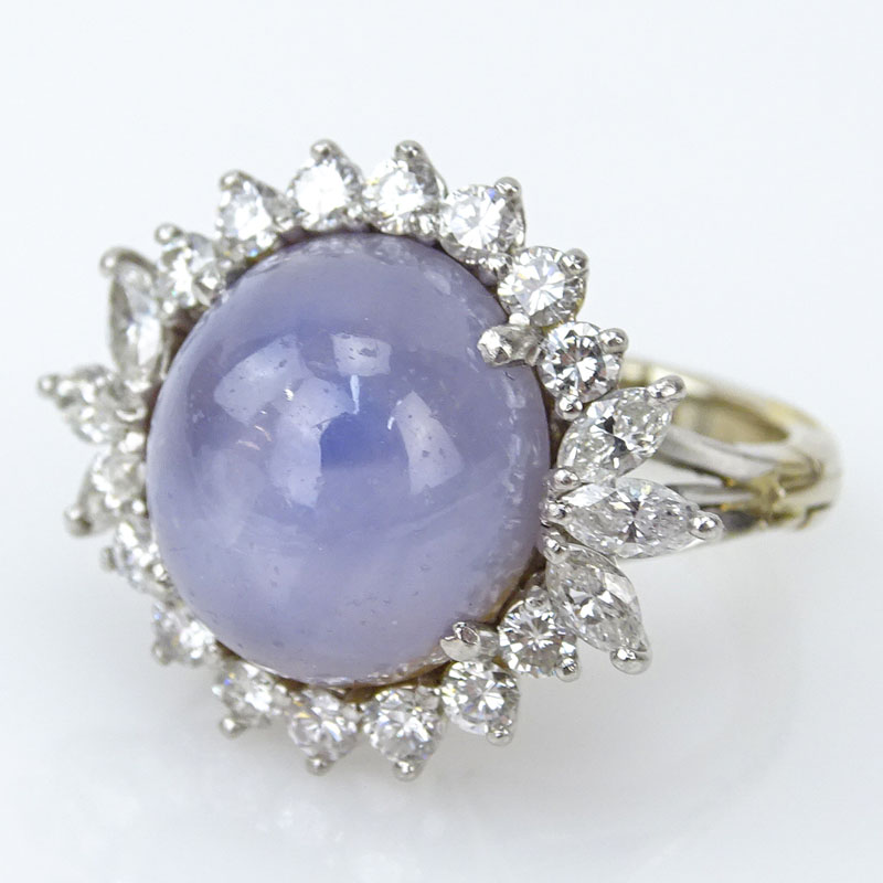 20.0 Carat Cabochon Star Sapphire, 2.0 Carat Round Brilliant Cut Diamond, Platinum and 14 Karat Gold Ring. 