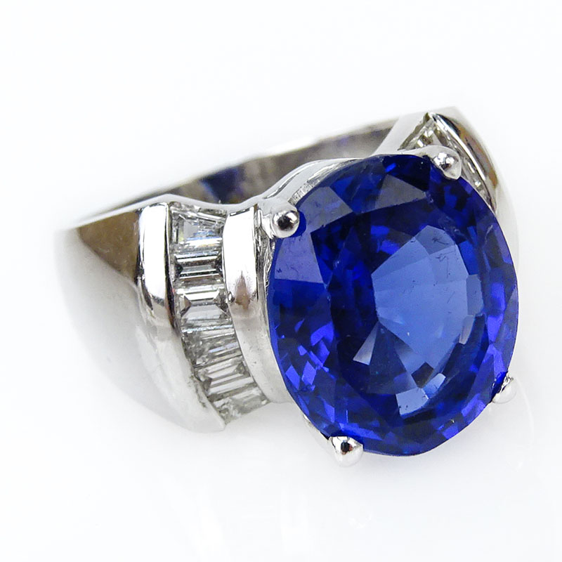 7.51 Carat Oval Cut Tanzanite, Diamond and 14 Karat White Gold Ring. 