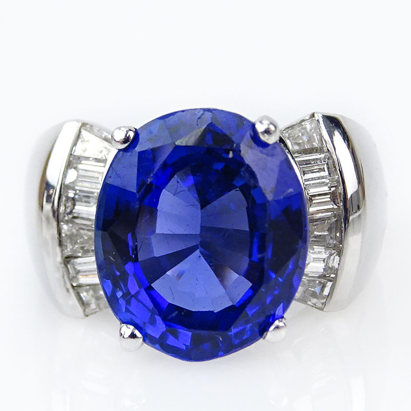 7.51 Carat Oval Cut Tanzanite, Diamond and 14 Karat White Gold Ring. 