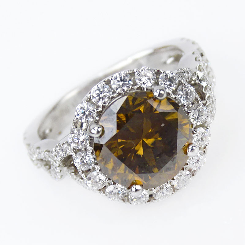 3.23 Carat Round Brilliant Cut Fancy Intense Brown Orangey Yellow Diamond and 18 Karat White Gold Engagement Ring