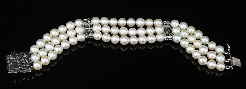 14 Karat White Gold, Diamond and Three Strand White Pearl Bracelet