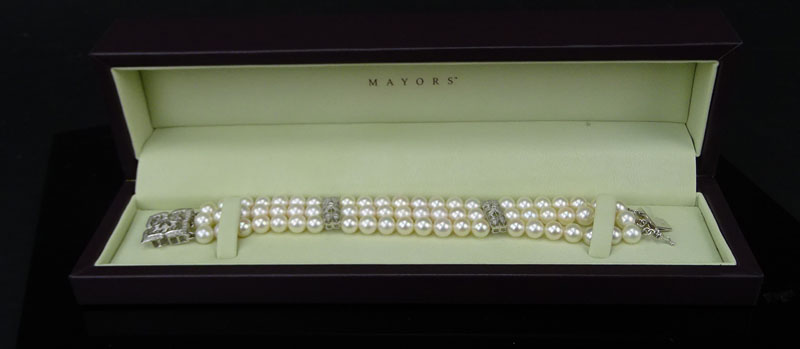 14 Karat White Gold, Diamond and Three Strand White Pearl Bracelet