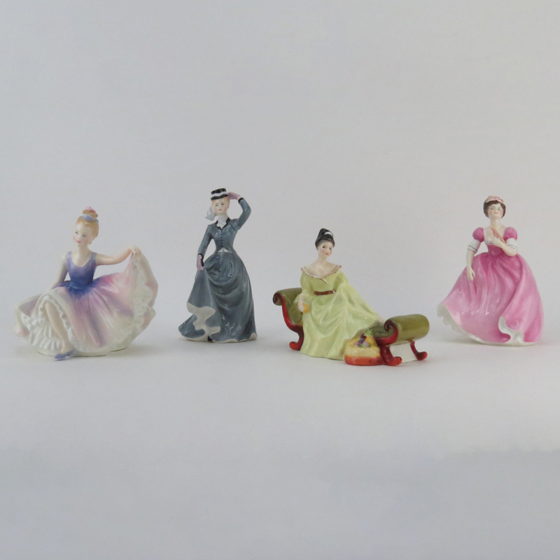 Group Of Four (4) Porcelain Figurines