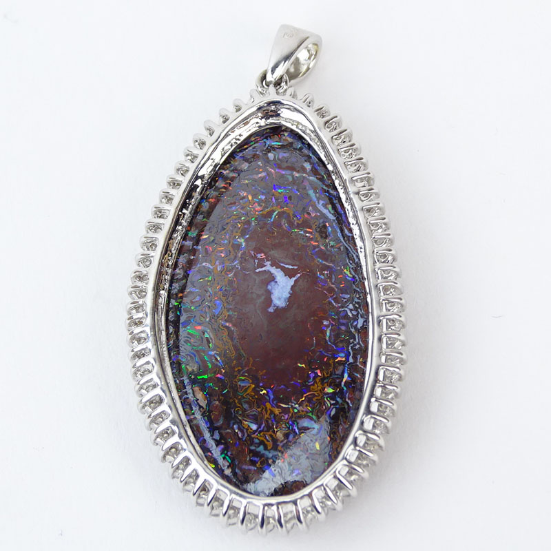 Large Black Opal and 18 Karat White Gold Pendant with Diamond Bezel