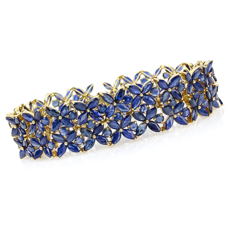 Round and Marquise Cut Sapphire and 14 Karat Yellow Gold Bracelet