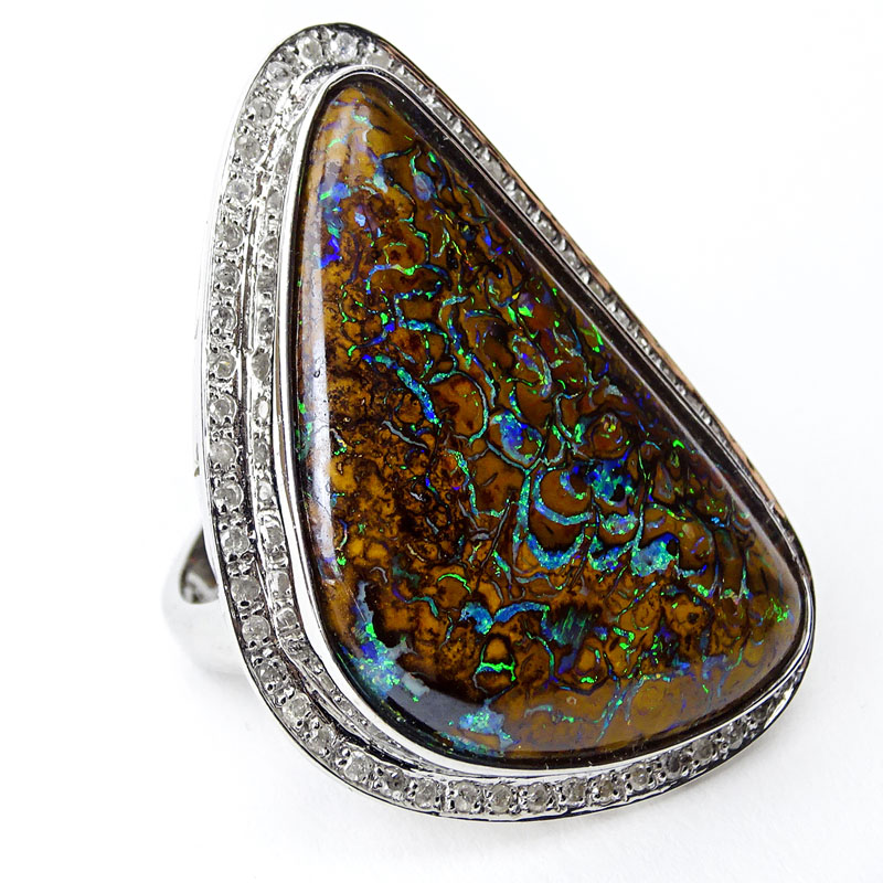 Large Black Opal and 18 Karat White Gold Ring with Diamond Bezel