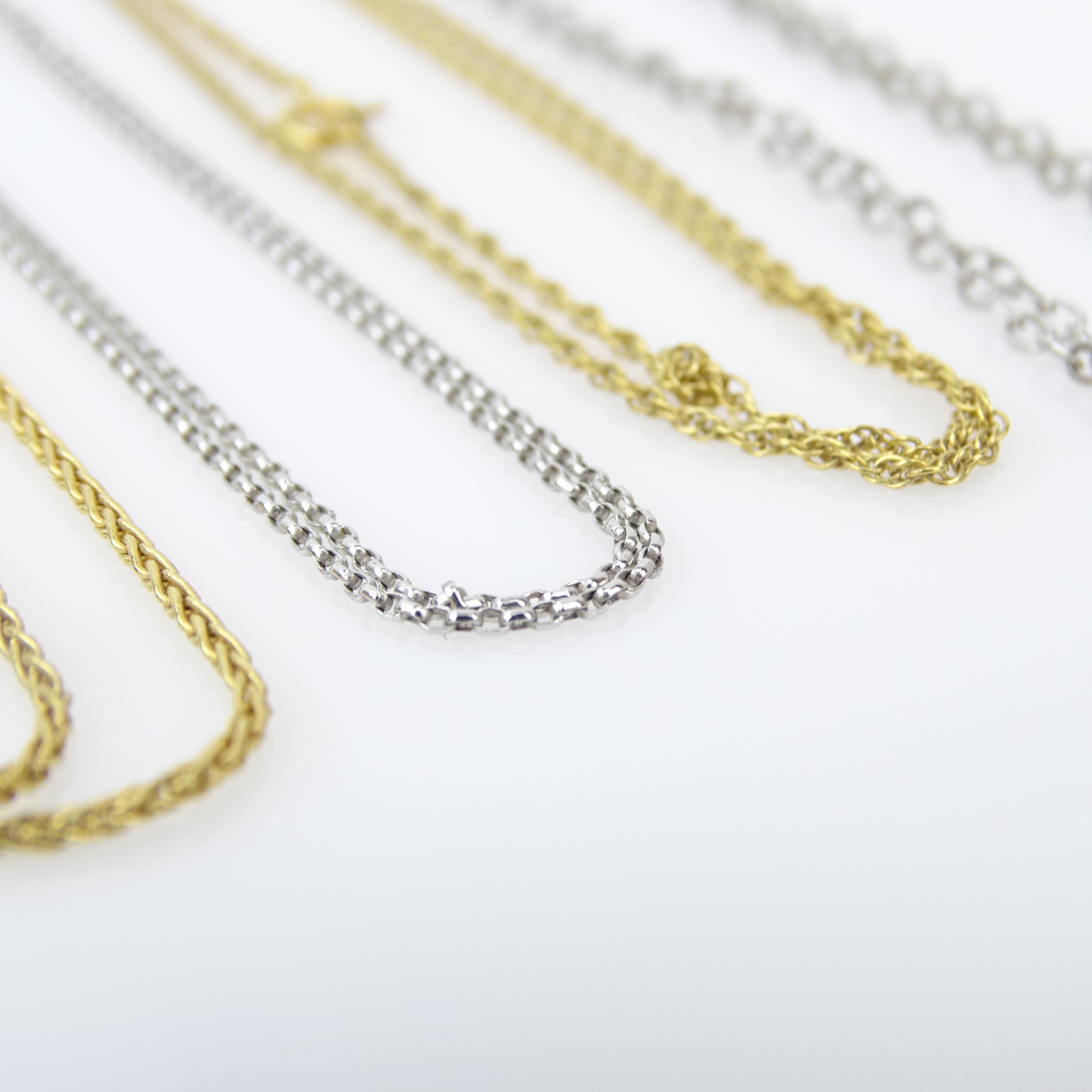 Four (4) 14 Karat Gold Chains Including Two (2) White Gold and Two (2) Yellow Gold