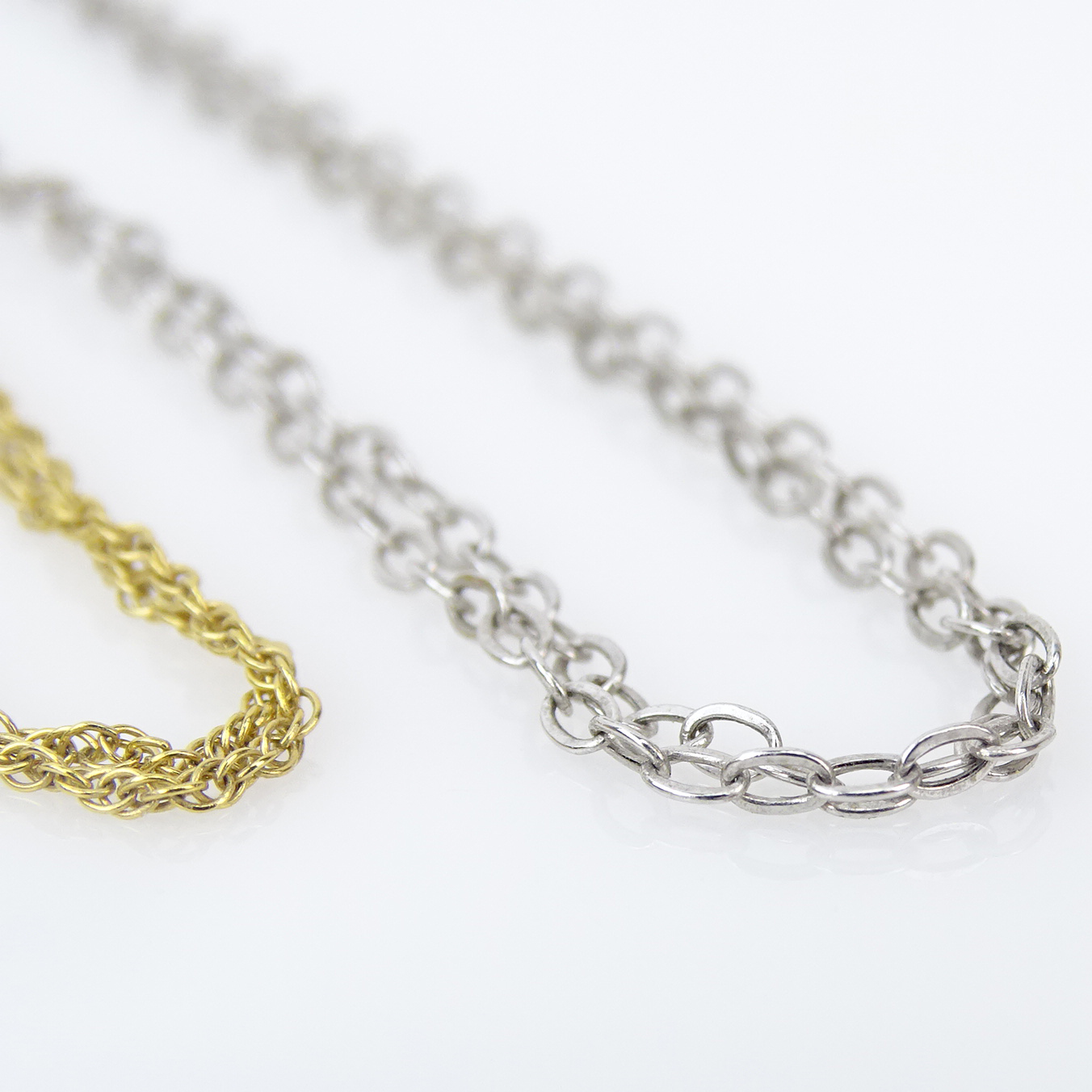 Four (4) 14 Karat Gold Chains Including Two (2) White Gold and Two (2) Yellow Gold