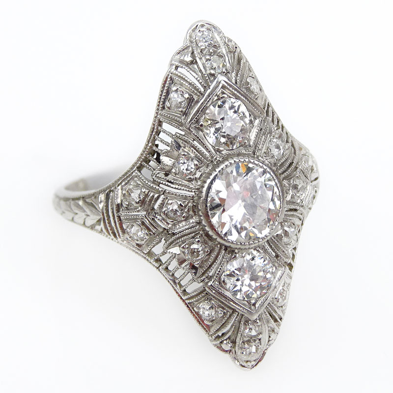 1.55 Carat Diamond and Filigree Platinum Ring set in the center with an Approx. .70 Carat Round Brilliant Cut Diamond.