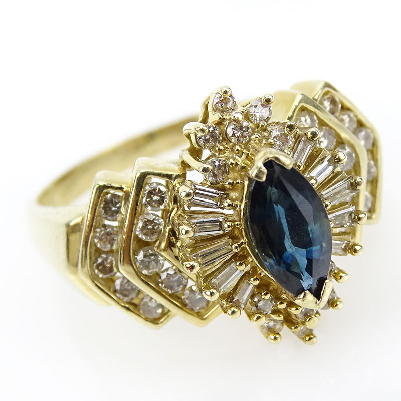 Lady's Marquise Cut Sapphire, Diamond and 14 Karat Yellow Gold Cluster Ring