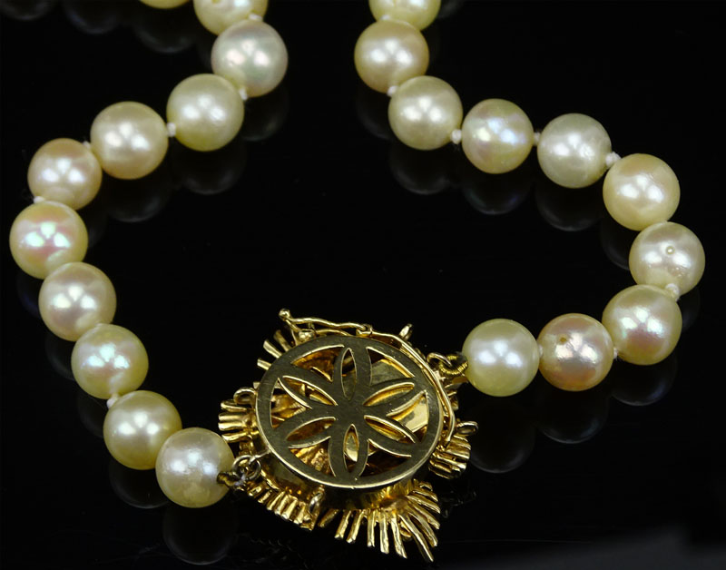 Vintage Single Strand White Pearl Necklace with 14 Karat Yellow Gold Clasp accented with Diamonds and Rubies