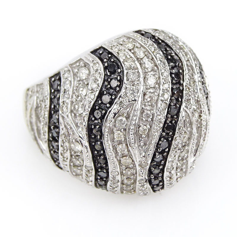 1.50 Carat Pave Set Round Cut Fancy Black Diamond, 1.50 Carat Pave Set White Diamond and 14 Karat White Gold Dome Ring.