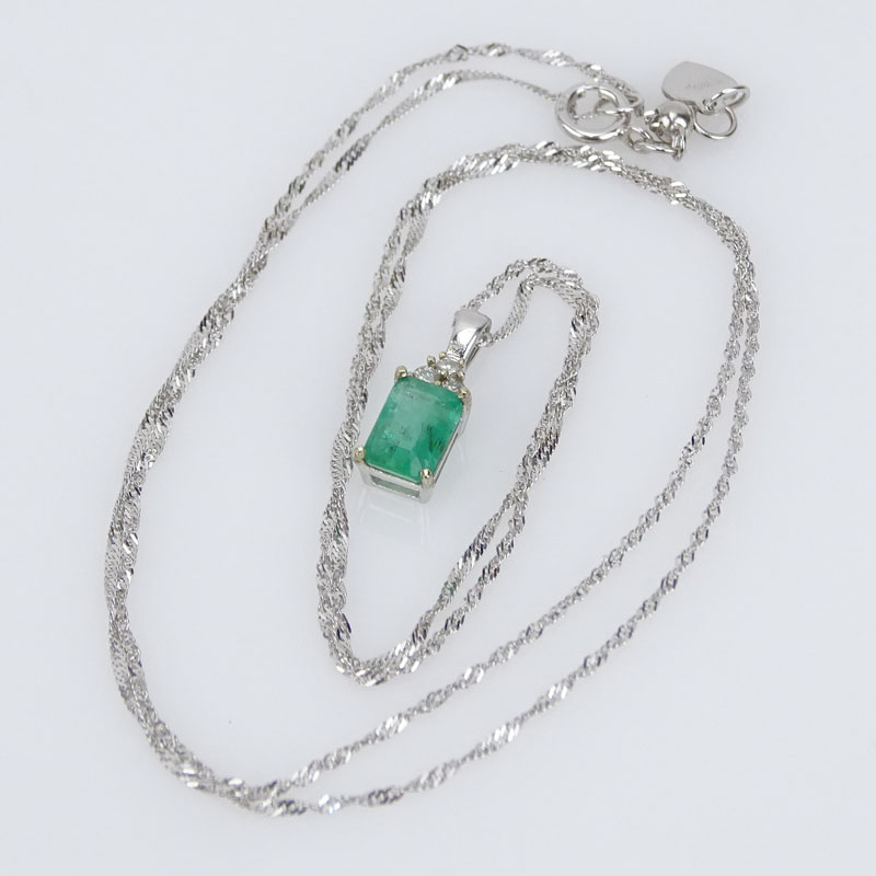 1.0 Carat Emerald, .10 Carat Diamond and 14 Karat White Gold Pendant Necklace.