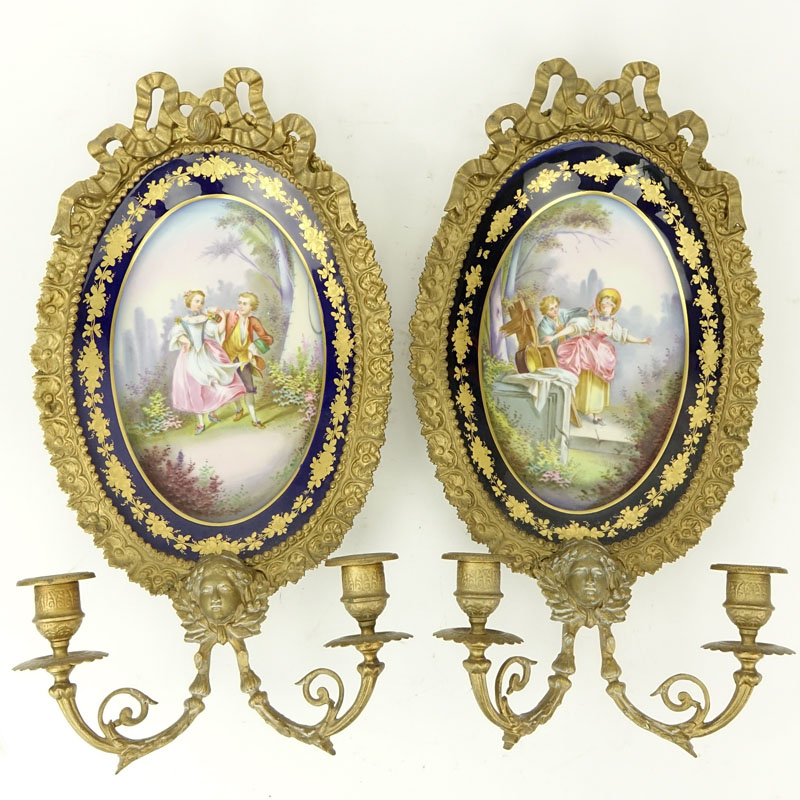 Pair French Sevres Style Gilt Bronze And Hand painted Porcelain Two Light Sconces