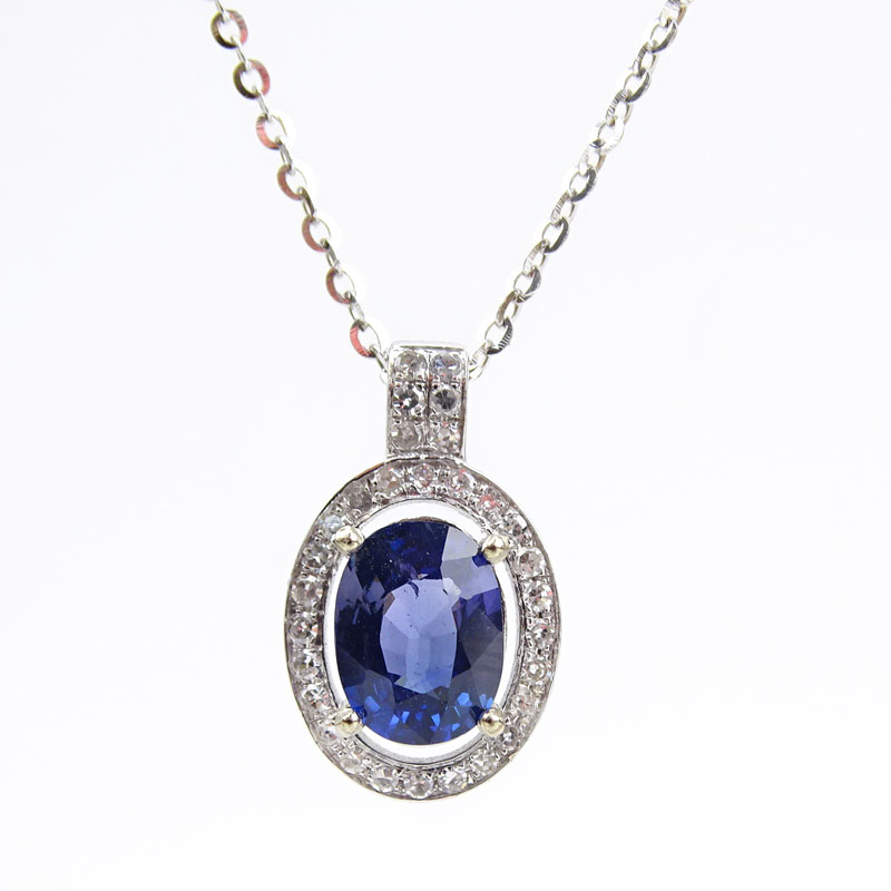 1.27 Carat Oval Cut Natural Unheated Change Color Sapphire, Diamond and 18 Karat White and Yellow Gold Pendant Necklace.