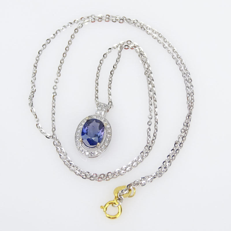 1.27 Carat Oval Cut Natural Unheated Change Color Sapphire, Diamond and 18 Karat White and Yellow Gold Pendant Necklace.