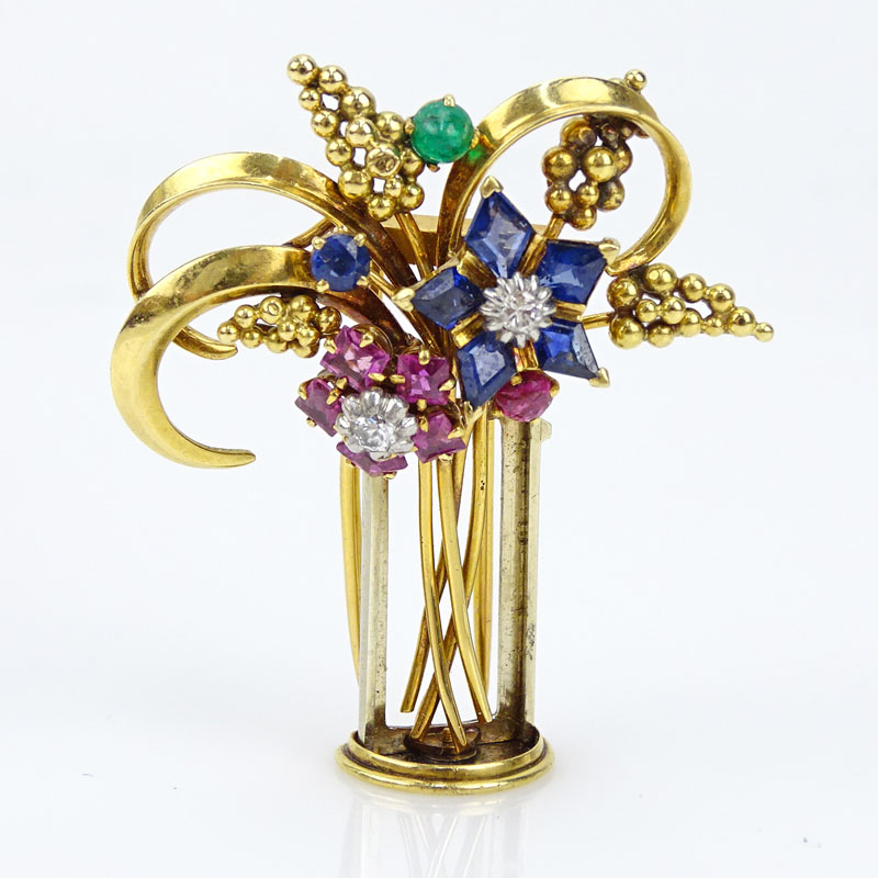 Circa 1940's 18 Karat Yellow Gold and Multi Gemstone Brooch set with Sapphires, Rubies, Emeralds and Diamonds