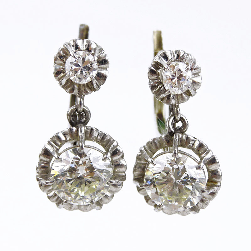 2.45 Carat Total Weight Round Brilliant Cut Diamond and 18 Karat White Gold Earrings.