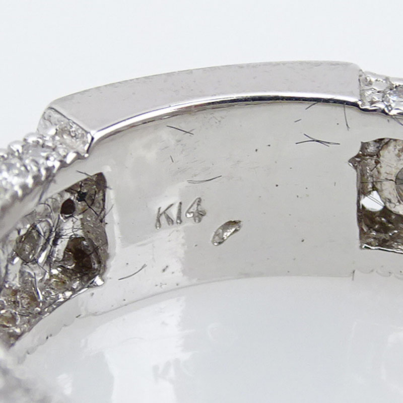 1.36 Carat TW Round Brilliant Cut Diamond and 14 Karat White Gold Eternity Band.