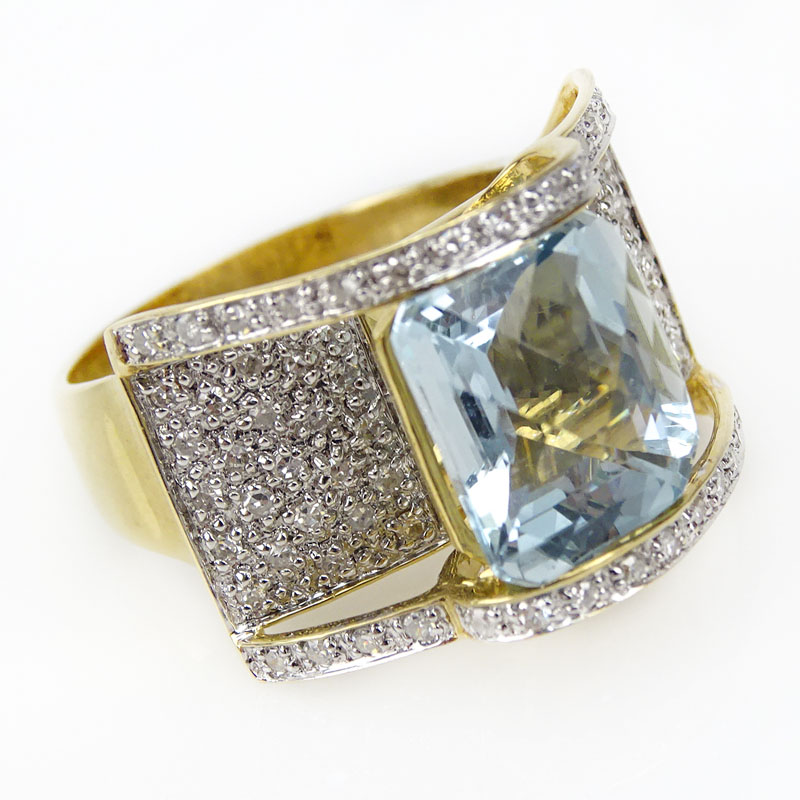 Lady's Chris Cross Cushion Cut Blue Topaz, Pave Set Diamond and 14 Karat Yellow Gold Ring