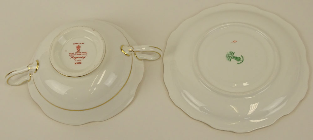 Partial Royal Crown Derby porcelain cream soup set in the "Regency" pattern