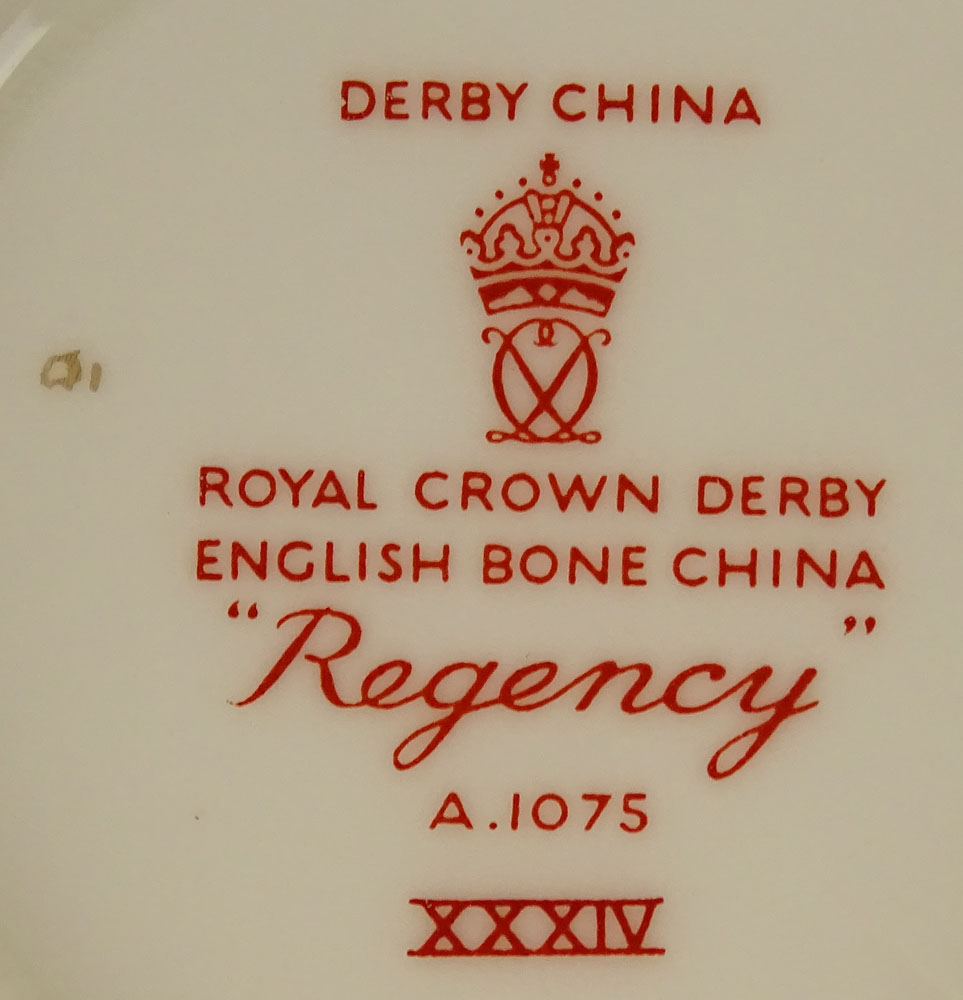 Partial Royal Crown Derby porcelain cream soup set in the "Regency" pattern