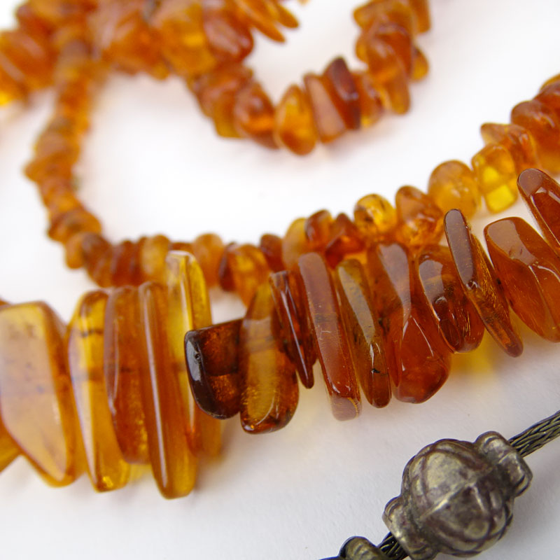 Three (3) Vintage Amber Bead Necklaces together with One Pair of Amber Earrings