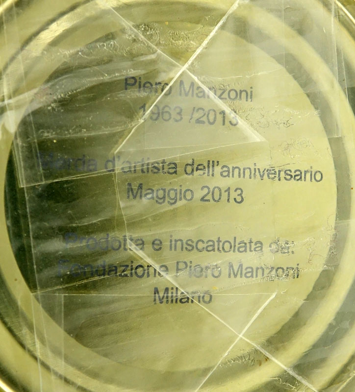 After Piero Manzoni, Italian (1933 - 1963) Tin can and Printed paper, in cellophane bag with thumbprint "Merda d'Arista - Artist's Shit".