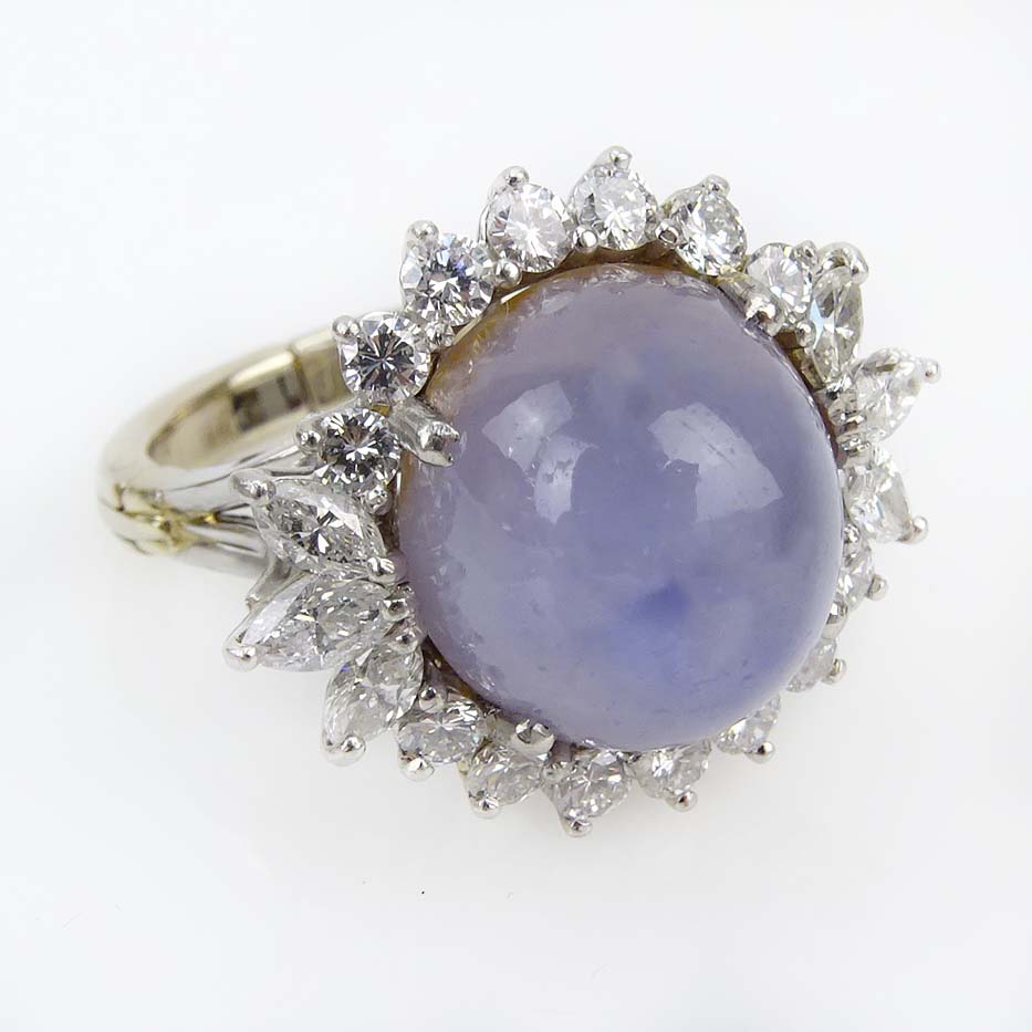 Vintage Approx. 20.0 Carat Cabochon Star Sapphire, 2.0 Carat Round Brilliant Cut Diamond, Platinum and 14 Karat Gold Ring. 