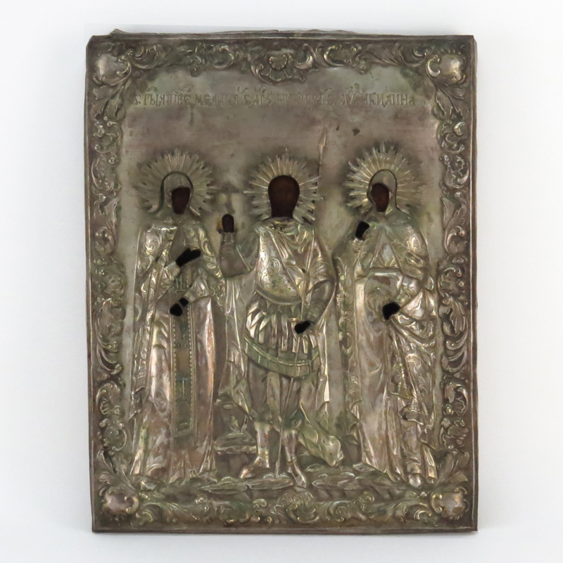 18th Century Russian Hand Painted Russian Icon On Wood With Silvered Metal Overlay.