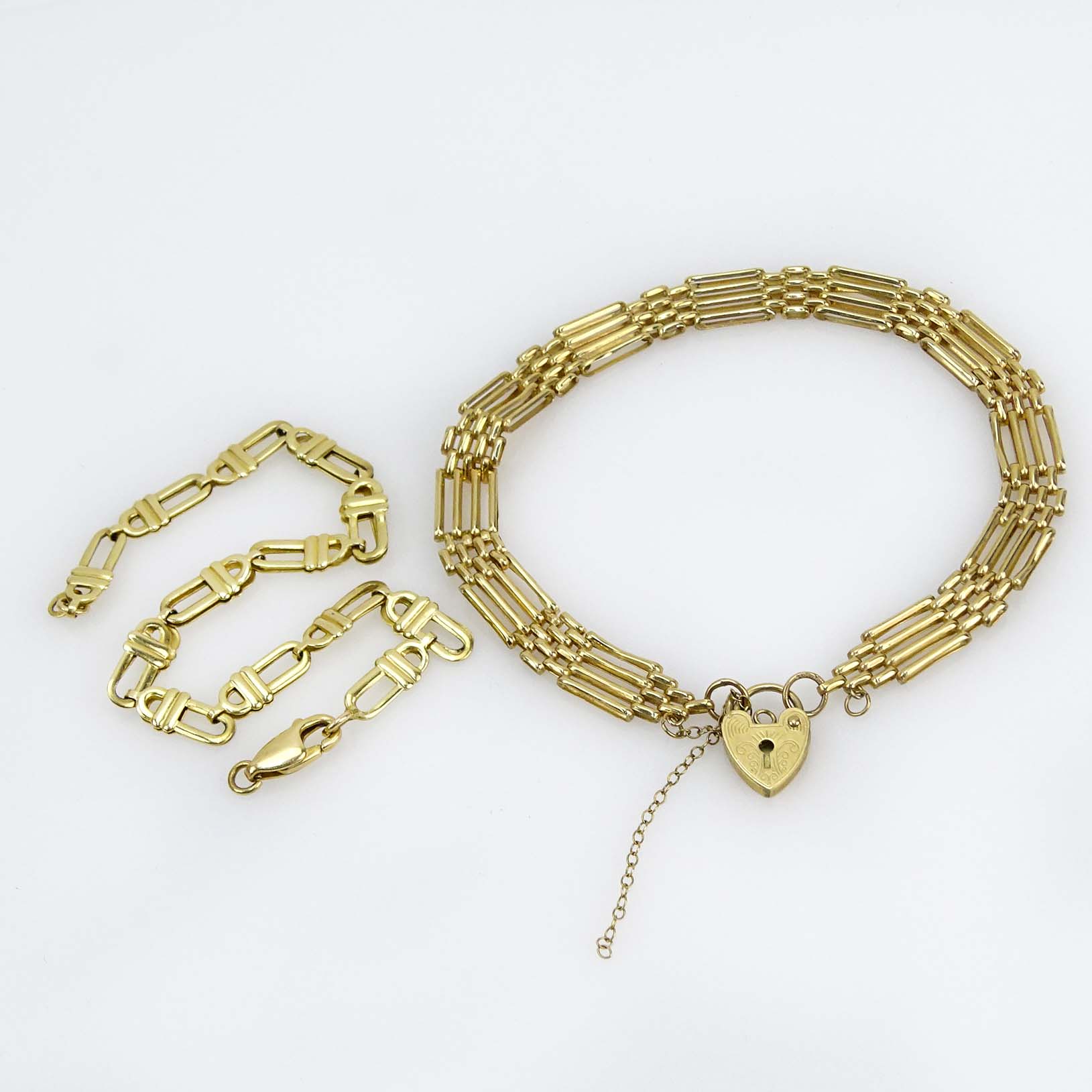 Vintage 14 Karat Yellow Gold Link Bracelet and Vintage 10 Karat Yellow Gold Link Bracelet with Heart Locket Clasp.