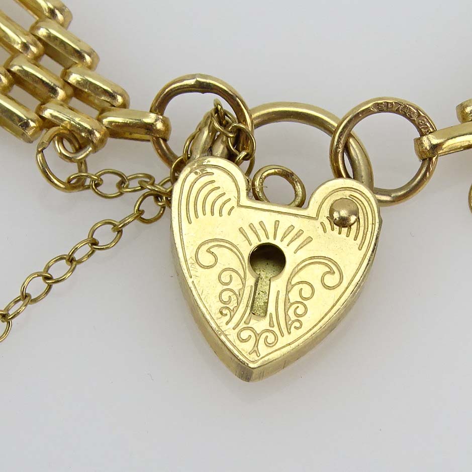 Vintage 14 Karat Yellow Gold Link Bracelet and Vintage 10 Karat Yellow Gold Link Bracelet with Heart Locket Clasp.