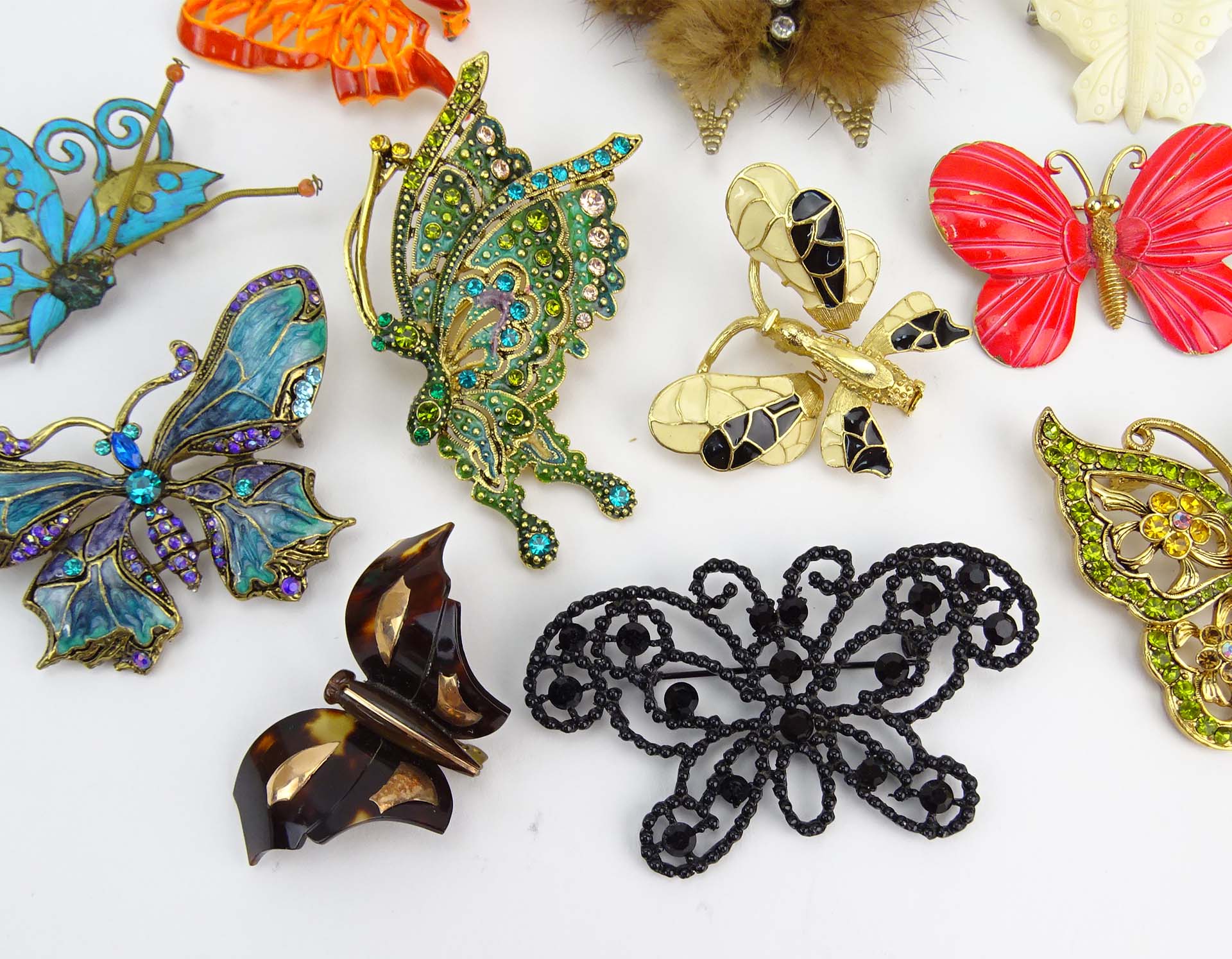 Collection of Seventeen (17) Fashion Butterfly Brooches variously with enamel and faux gem stones.