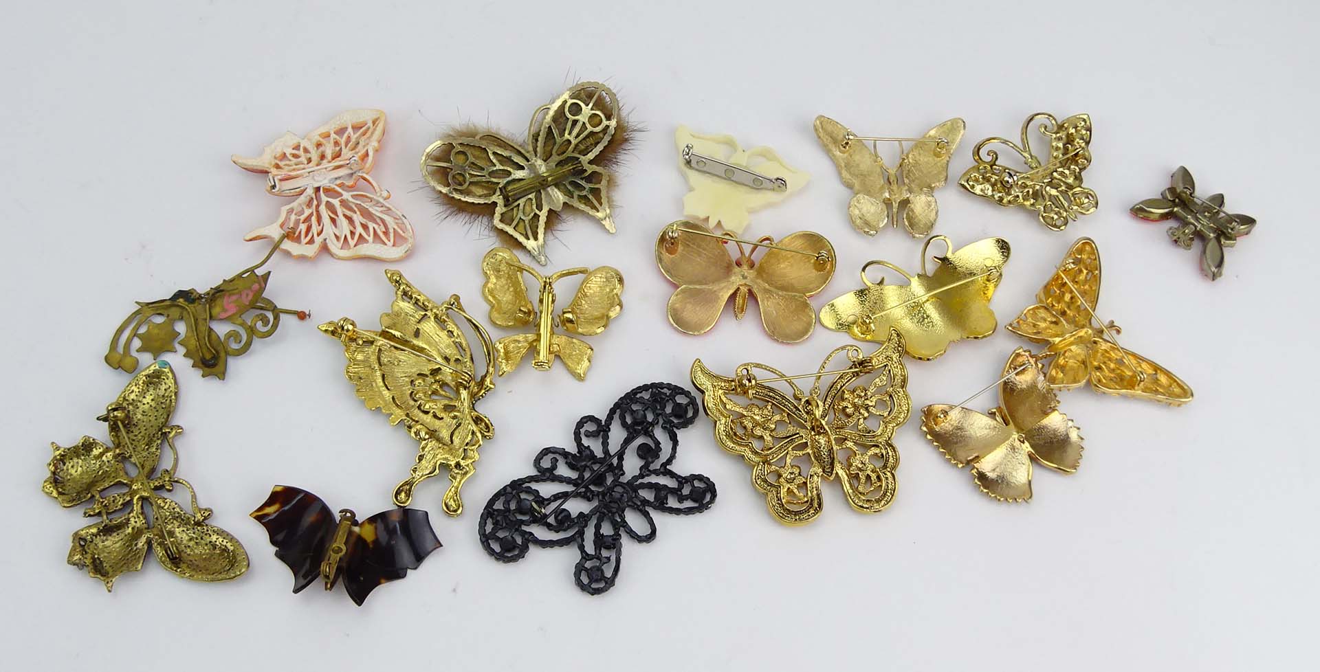 Collection of Seventeen (17) Fashion Butterfly Brooches variously with enamel and faux gem stones.