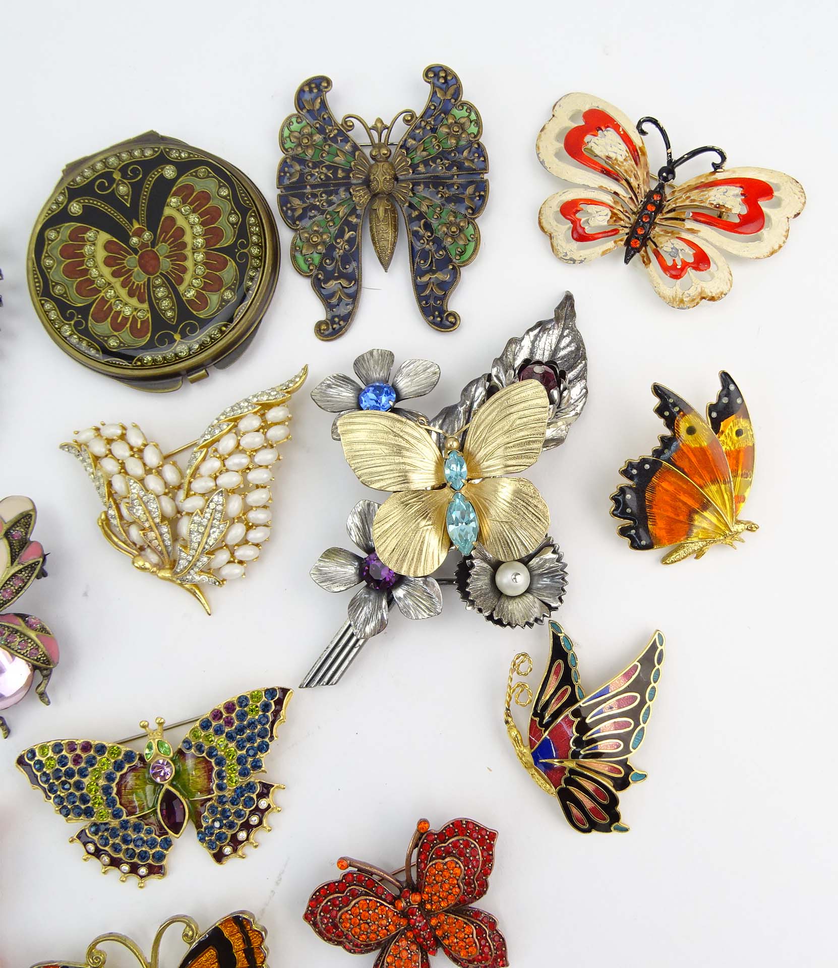 Collection of Fifteen (15) Fashion Butterfly Brooches and One (1) Compact variously with enamel and faux gem stones.